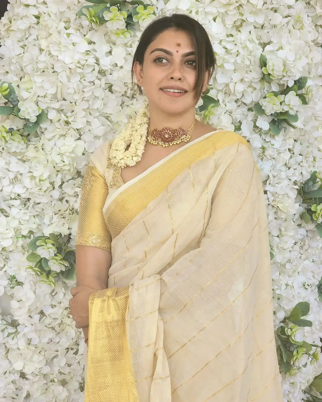 Anusree Nair Wearing Beautiful Earrings Jewellery White Pattu Saree